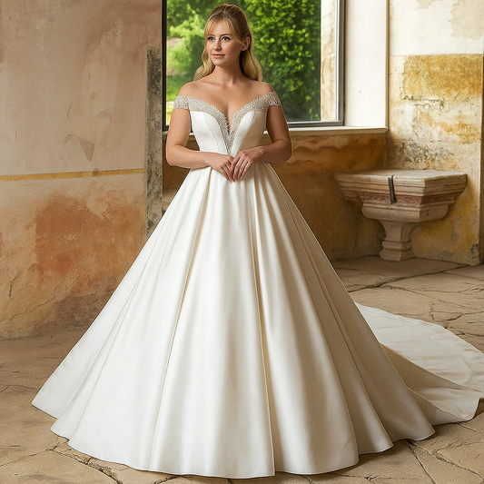 VESTIDO DE NOVIA CANDELARIA ESTILO PRINCESA ,HOMBROS DESCUBIERTOS EN RASO Y APLICACIONES