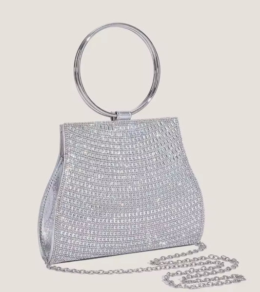 Bolso de fiesta Platino en tonos plateados con mango y cadena para colgar