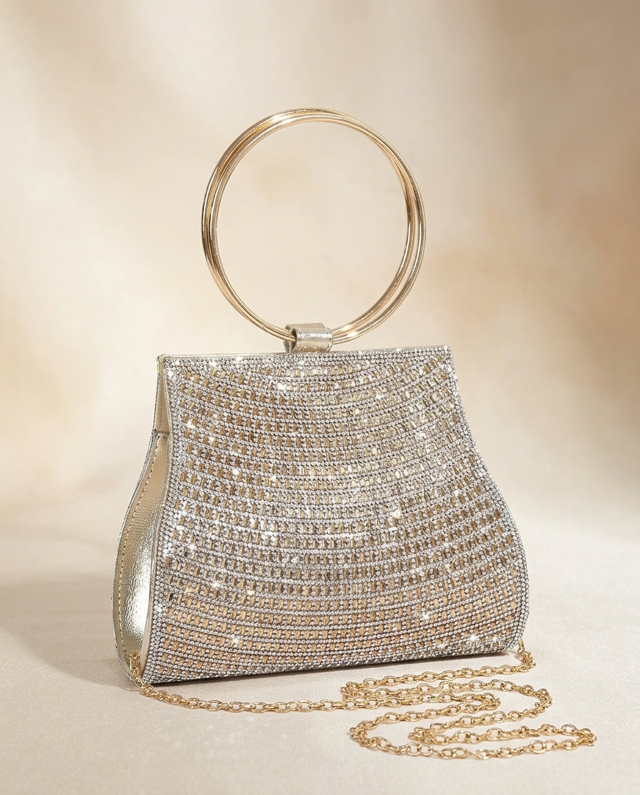Bolso de fiesta con manilla y cadena para colgar en tono dorado