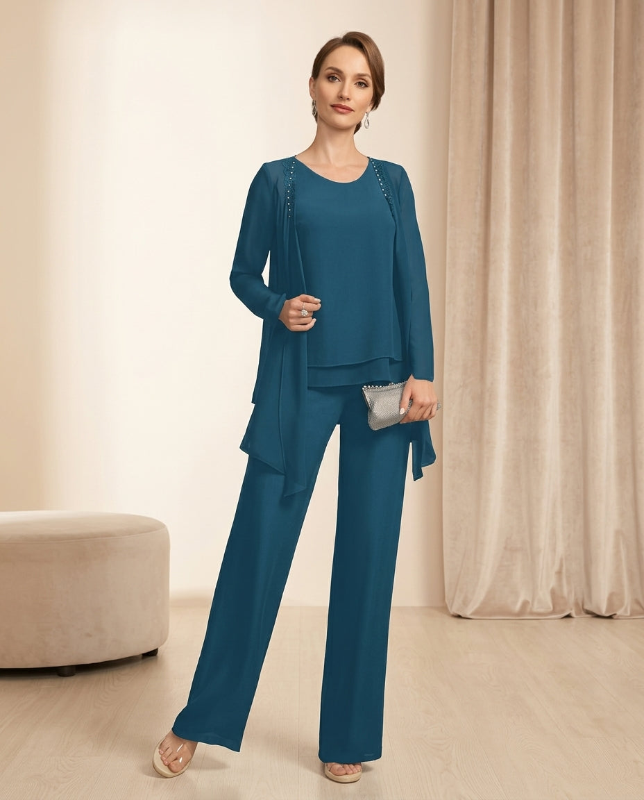 Traje de fiesta Tamy en color petróleo de 3 piezas aplicaciones sutiles en chaqueta