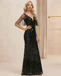 Vestido de fiesta Marion  color negro en lentejuelas y manga capa tul ,estilo semi sirena talla 40