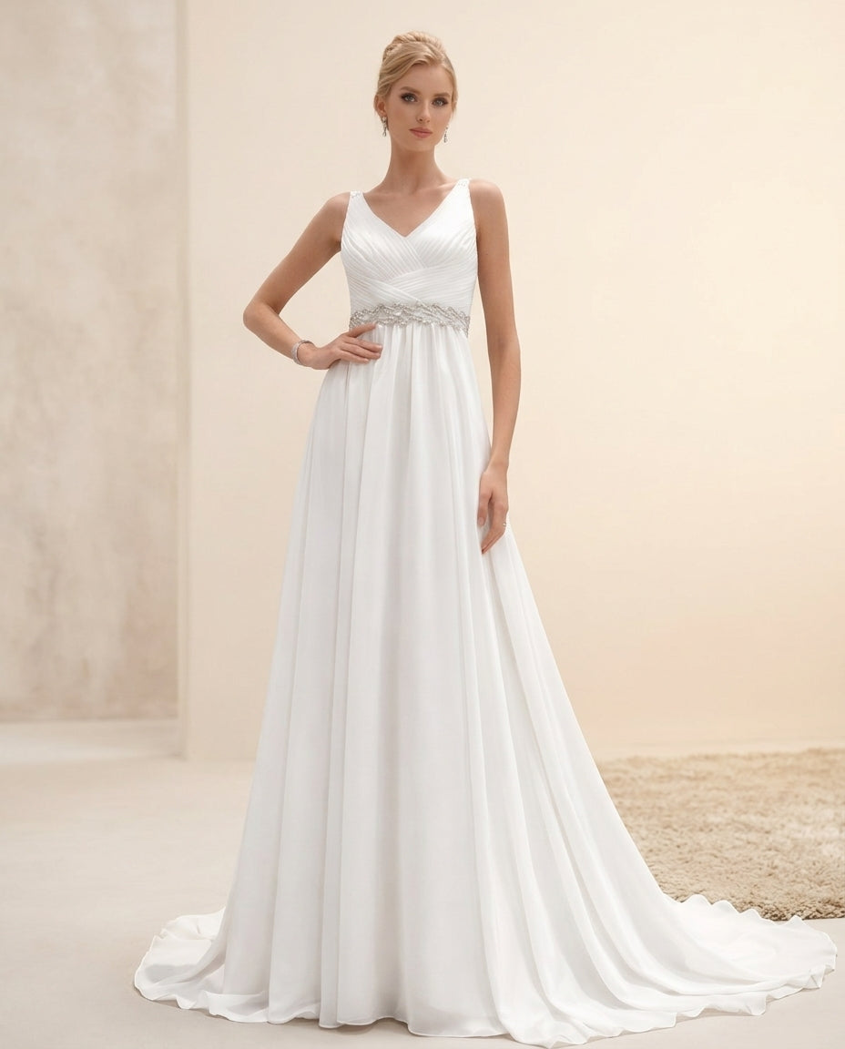 Vestido de novia Lirio con corte imperio escote V y falda fluida