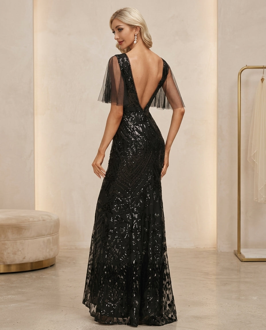 Vestido de fiesta Marion  color negro en lentejuelas y manga capa tul ,estilo semi sirena talla 40