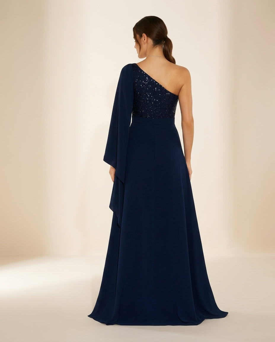 Vestido de fiesta melany asimétrico con manga capa ,brillos y glamour
