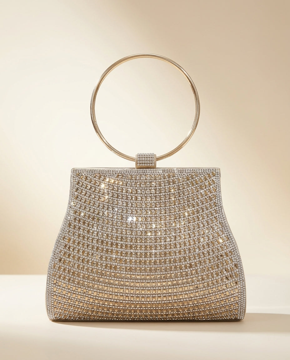 Bolso de fiesta con manilla y cadena para colgar en tono dorado