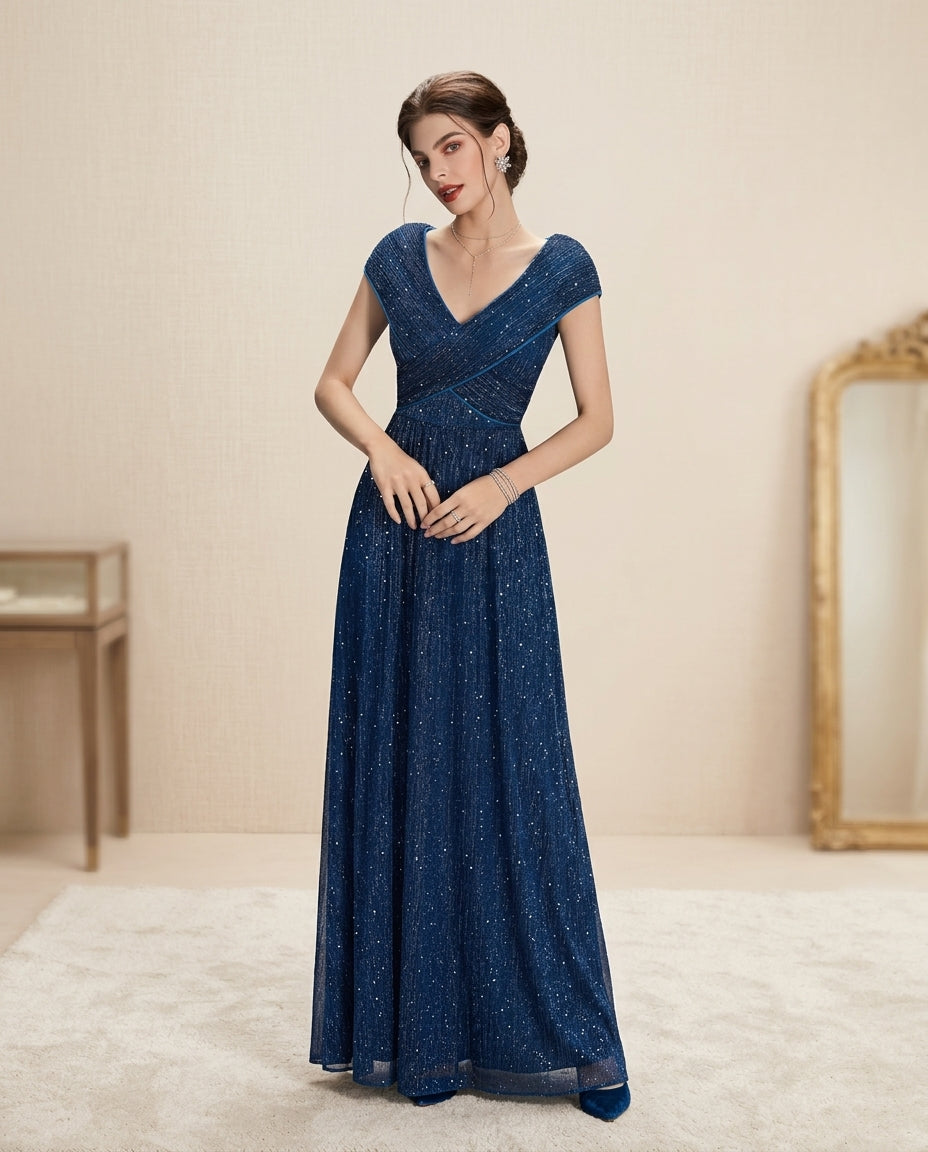 Vestido de fiesta Cony en color petroleo y talla 38 con sutiles brillos