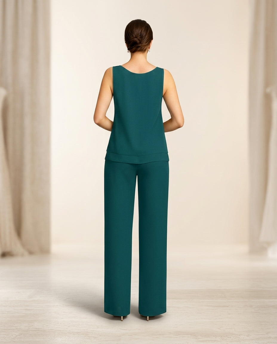 Traje de fiesta Tamy en color petróleo de 3 piezas aplicaciones sutiles en chaqueta