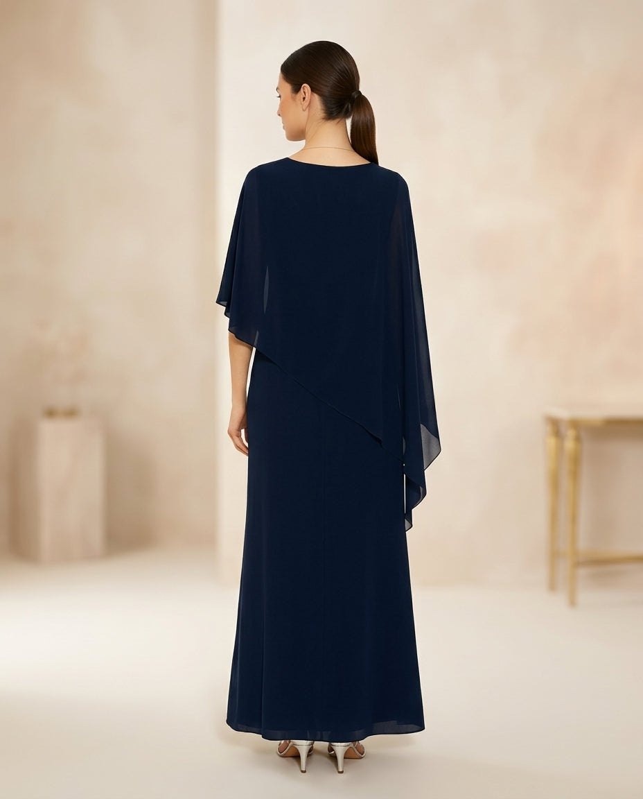 Vestido de fiesta Milena con capa y flor lateral , falda en seda fría capa en gasa