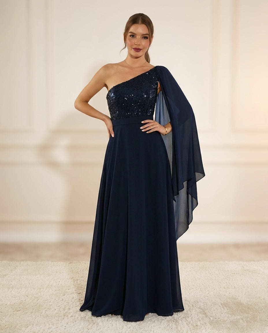 Vestido de fiesta melany asimétrico con manga capa ,brillos y glamour