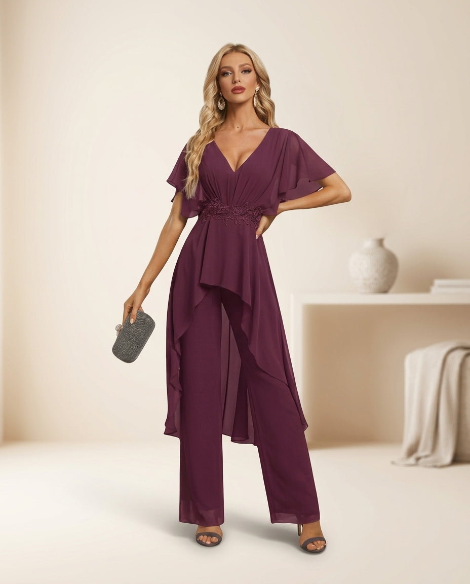 Enterito de fiesta one con cola y aplicaciones en la cintura ,manga acampanada