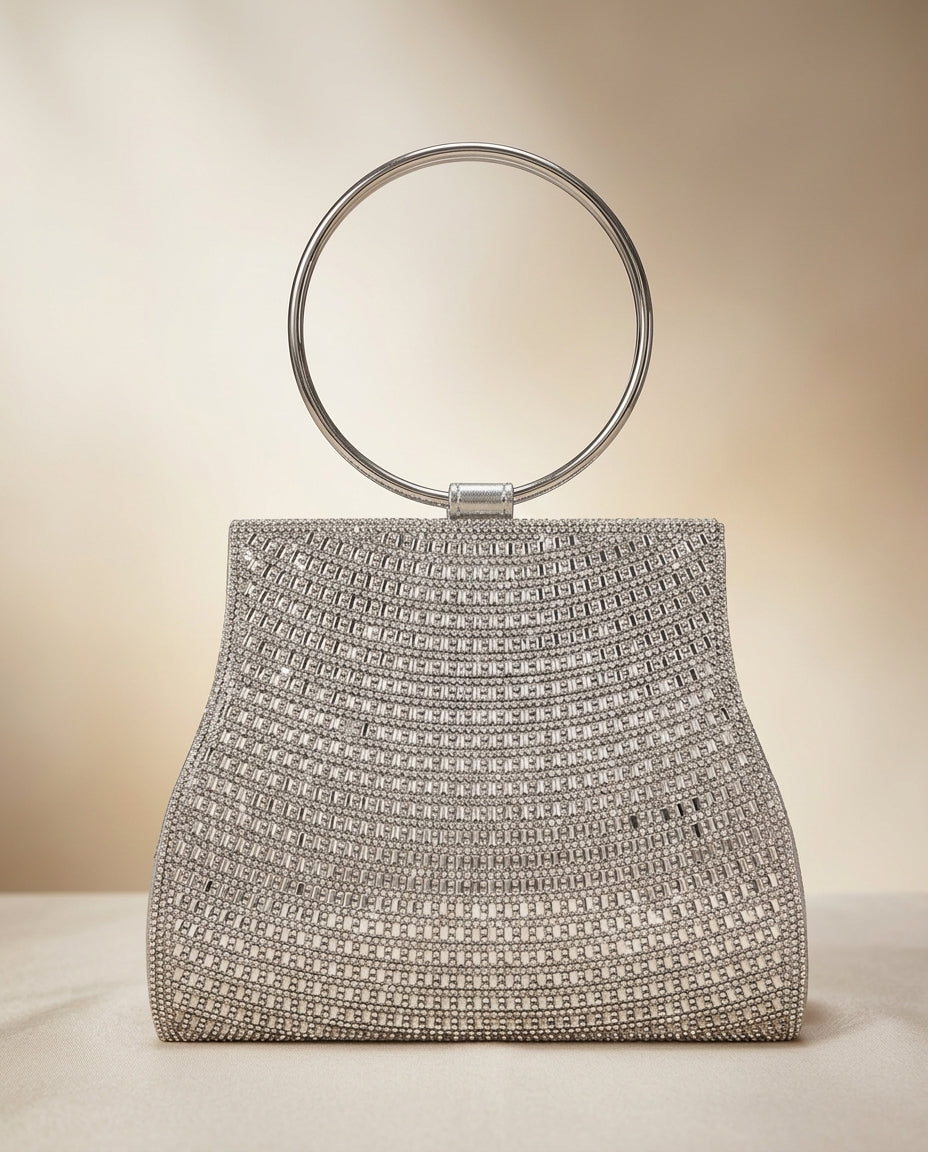 Bolso de fiesta Platino en tonos plateados con mango y cadena para colgar