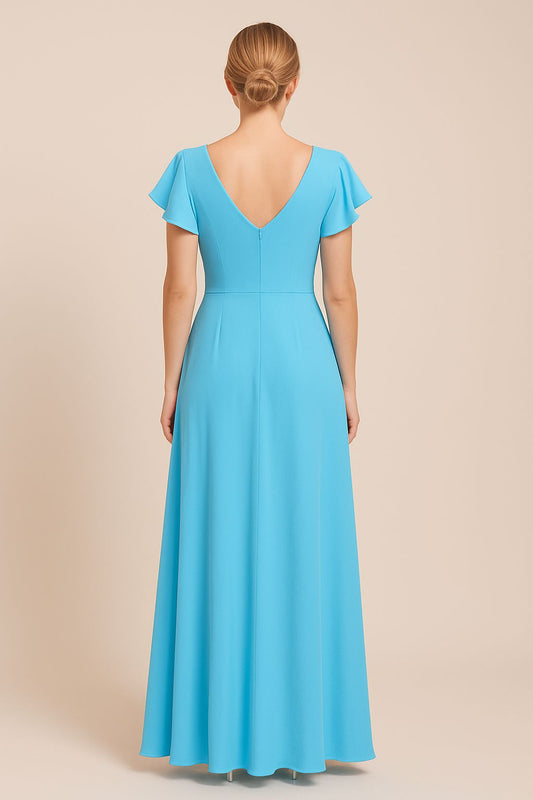 VESTIDO DE FIESTA  CLAUSS, EN COLOR CALIPSO Y VOLANTES , EN TALLA 38