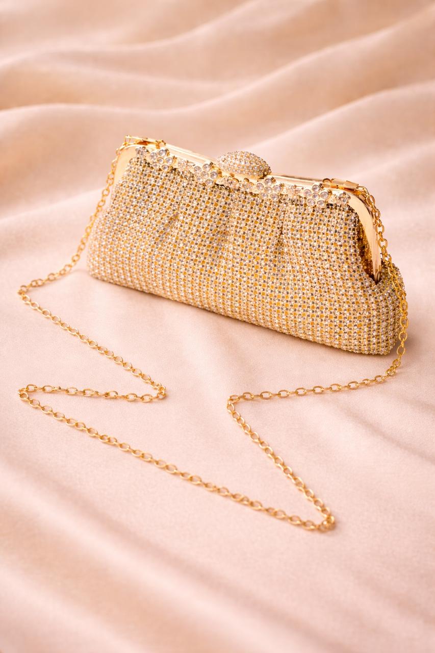 Clutch de fiesta Luxor dorado pedrería y cadena para colgar