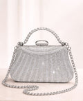 Bolso de fiesta New york con manilla y brillos en plateado