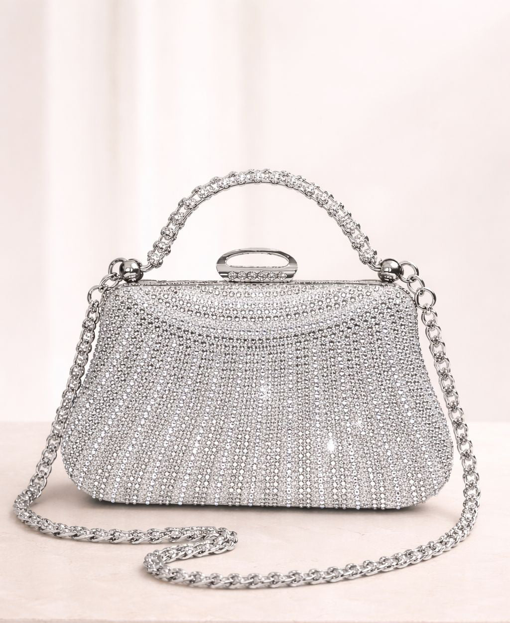 Bolso de fiesta New york con manilla y brillos en plateado
