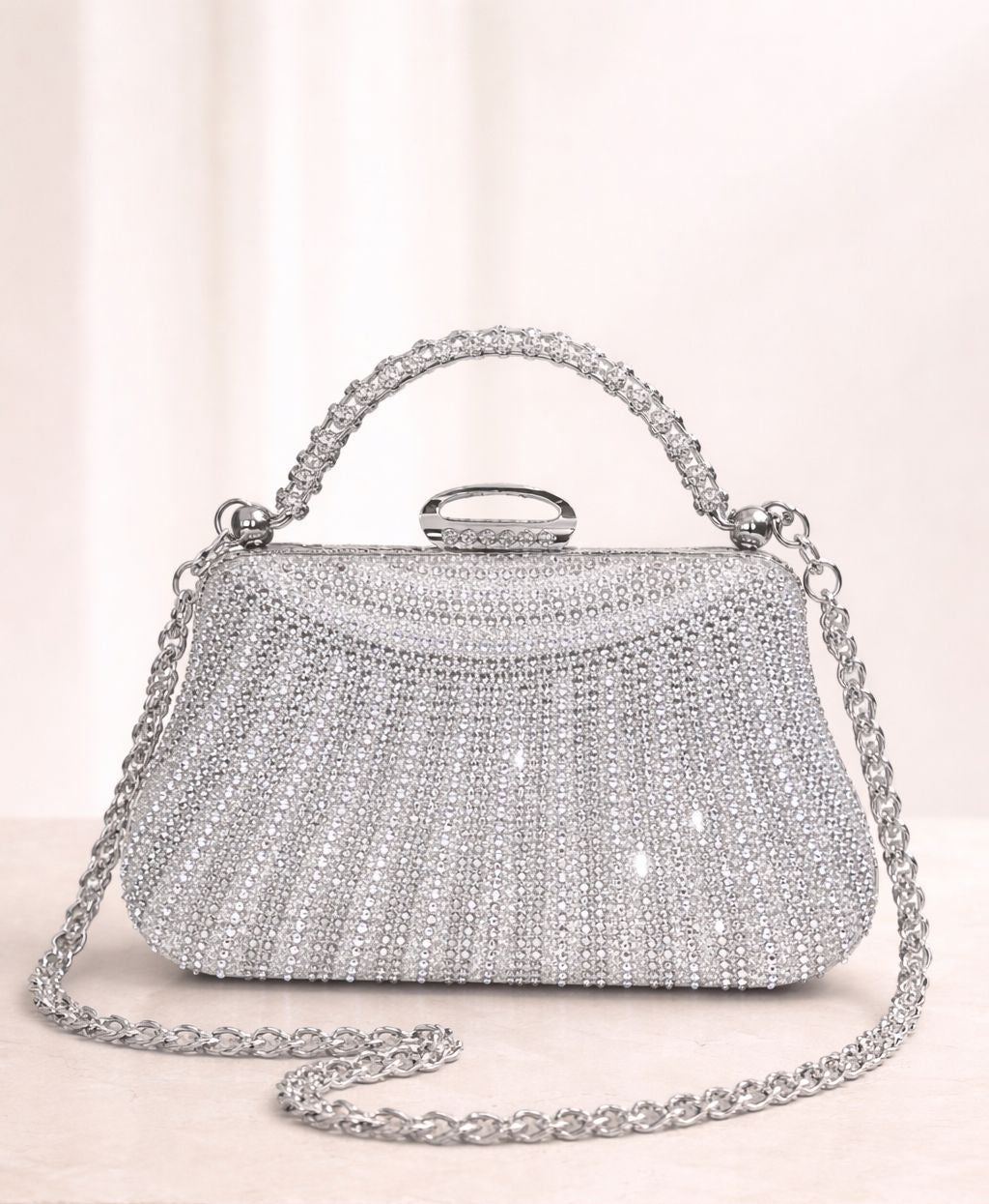 Bolso de fiesta New york con manilla y brillos en plateado