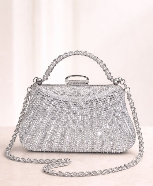 Bolso de fiesta New york con manilla y brillos en plateado