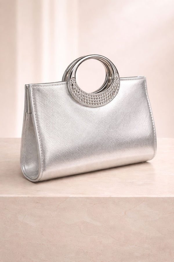 Bolso de fiesta Dore star en tono plateado  y aplicaciones brillantes con mango y cadena para colgar