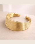 Pulsera metálica Petunia dorada ajustable