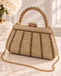 Bolso de fiesta New york con manilla y brillos en dorado champagne