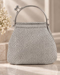 Bolso de fiesta Minerva en tonos plata , mango curvo y cadena para colgar