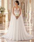 Vestido de novia Colomba encaje floral tirantes spaghetti y capa