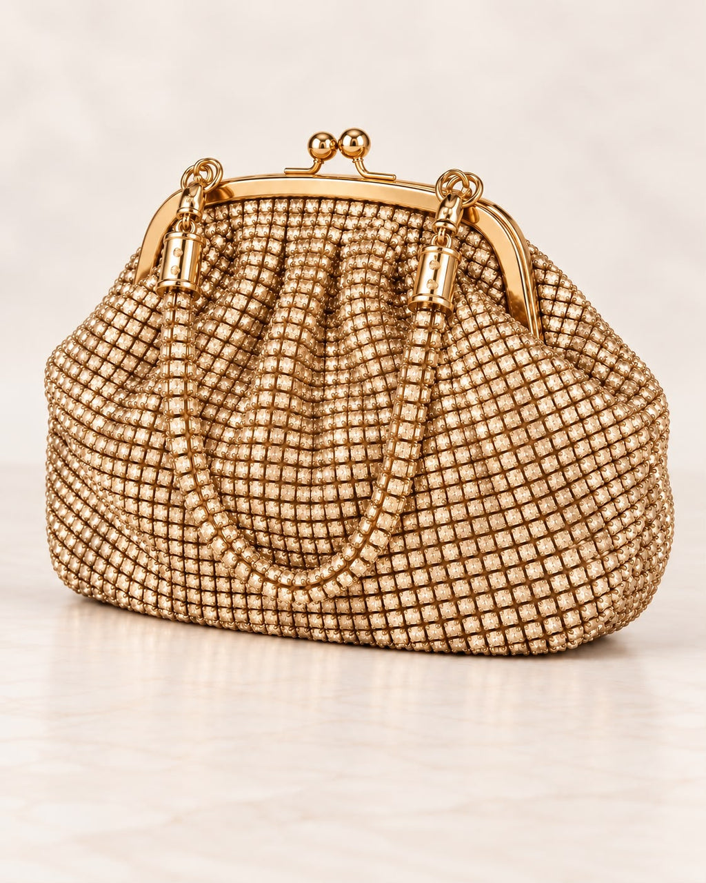 Bolso de fiesta Print en tono dorado y asa flexible