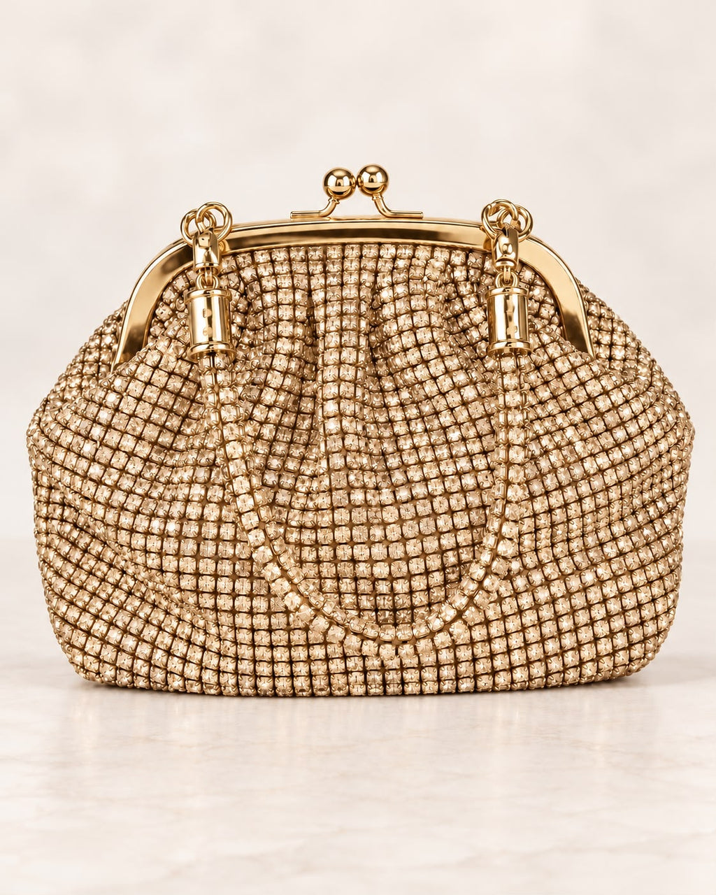 Bolso de fiesta Print en tono dorado y asa flexible