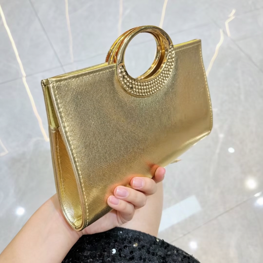 Bolso de fiesta Dore star en tonos dorados y aplicaciones brillantes con mango y cadena para colgar