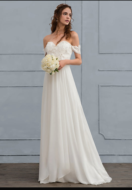 Vestido de novia Susy co mangas caídas y aplicaciones