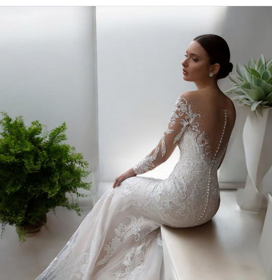 VESTIDO DE NOVIA MAGNOLIO ,ESTILO TROMPETA CON MANGAS Y MACRAMÉ